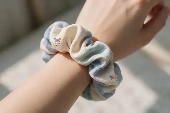 Close-up of custom scrunchies with printed logo, Colorfly Studio Dubai