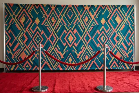 Custom printed step & repeat backdrop, made at Colorfly Studio in Dubai