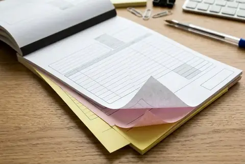 Custom 3-part NCR carbonless voucher pads printed in Dubai - Colorfly Studio